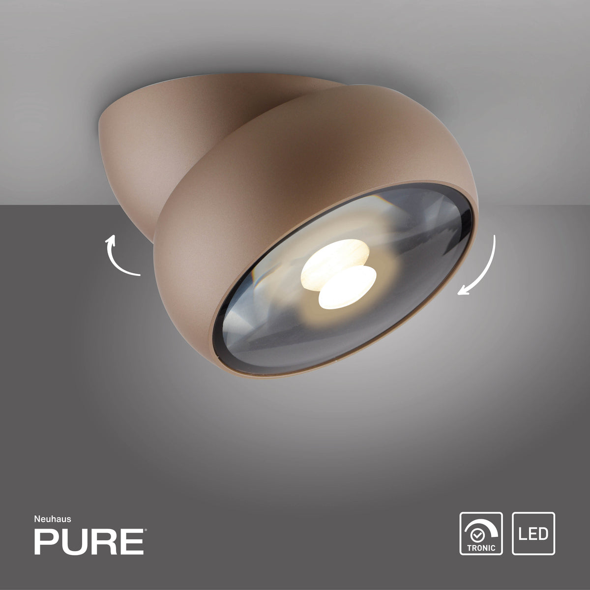 Luminaire orientable fixé au plafond, flèches blanches indiquant le sens de rotation possible.