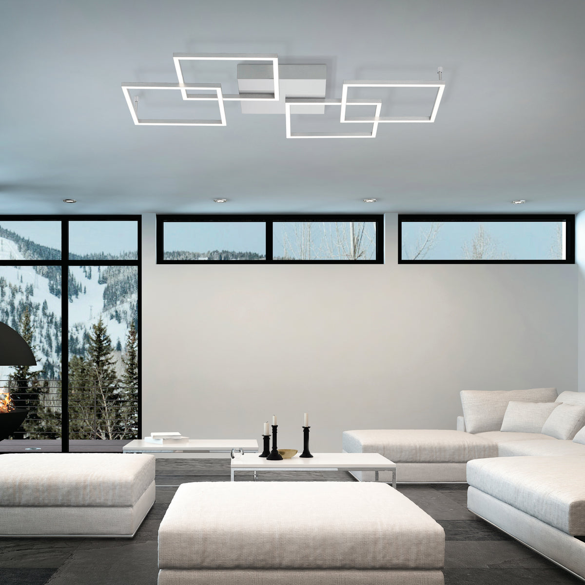Mise en ambiance dans un salon contemporain, plafonnier allumé au plafond près de grandes baies vitrées.