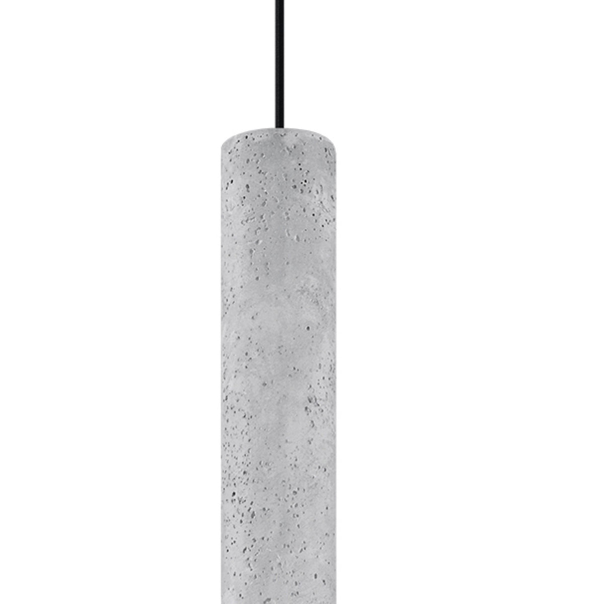 Gros plan sur le cylindre en béton brut et sa texture tachetée