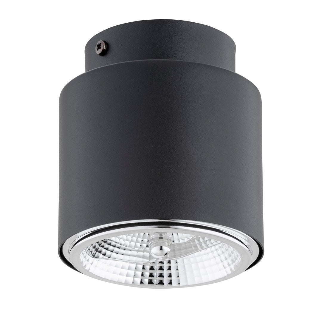 Plafonnier cylindrique noir vu de dessous avec verre strié et réflecteur chromé.
