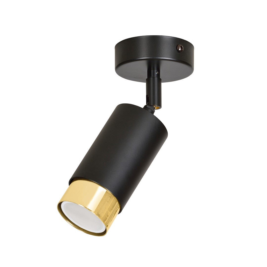 Spot orientable vu de trois quarts sur fond blanc, corps noir et anneau doré
