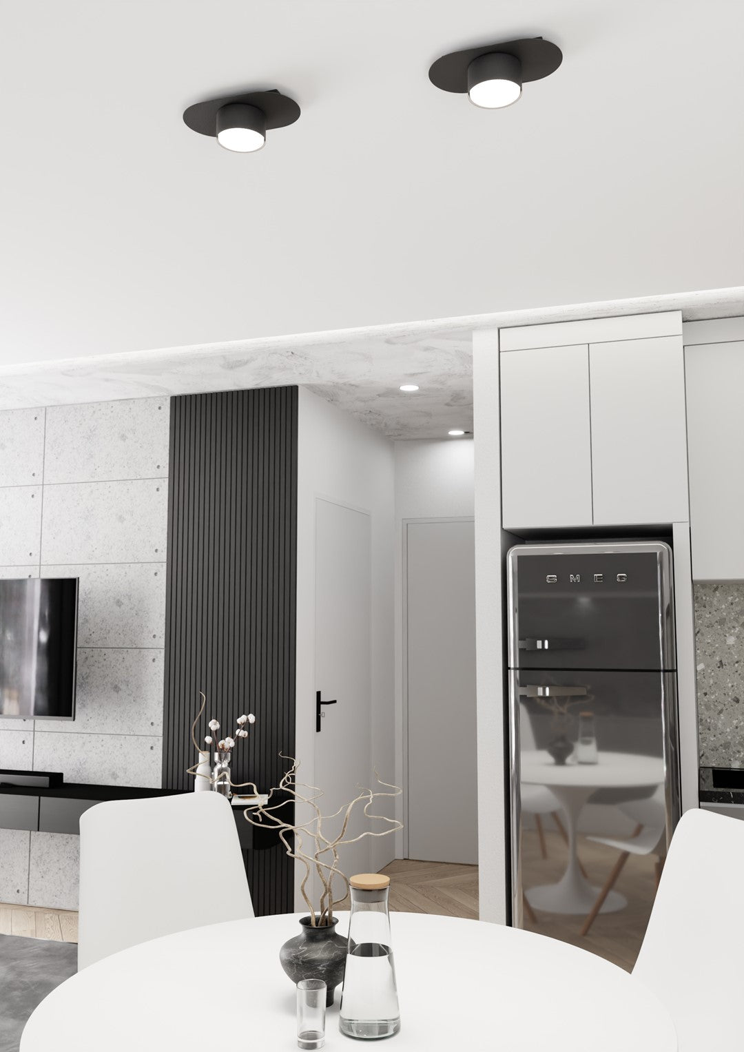 Mise en ambiance deux plafonniers noirs fixés au plafond d'une cuisine
