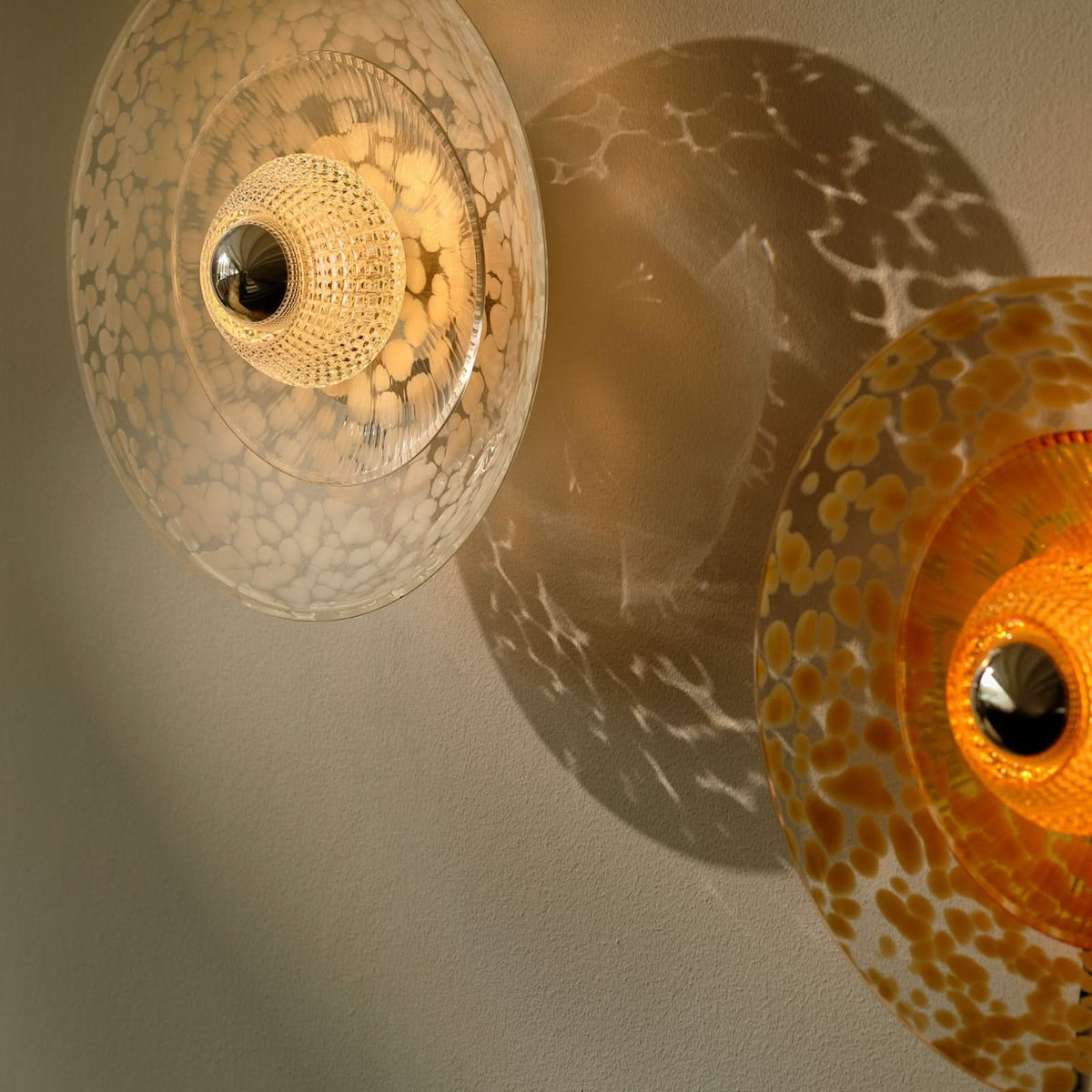 Applique murale Disco Rama en verre, ambre, Ø 49 cm