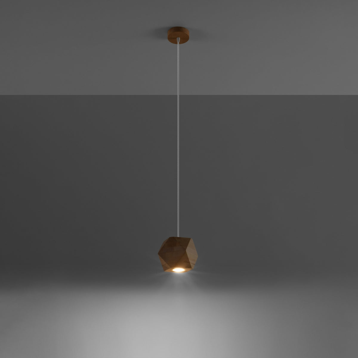 Mise en ambiance sombre montrant le halo lumineux diffusé vers le bas