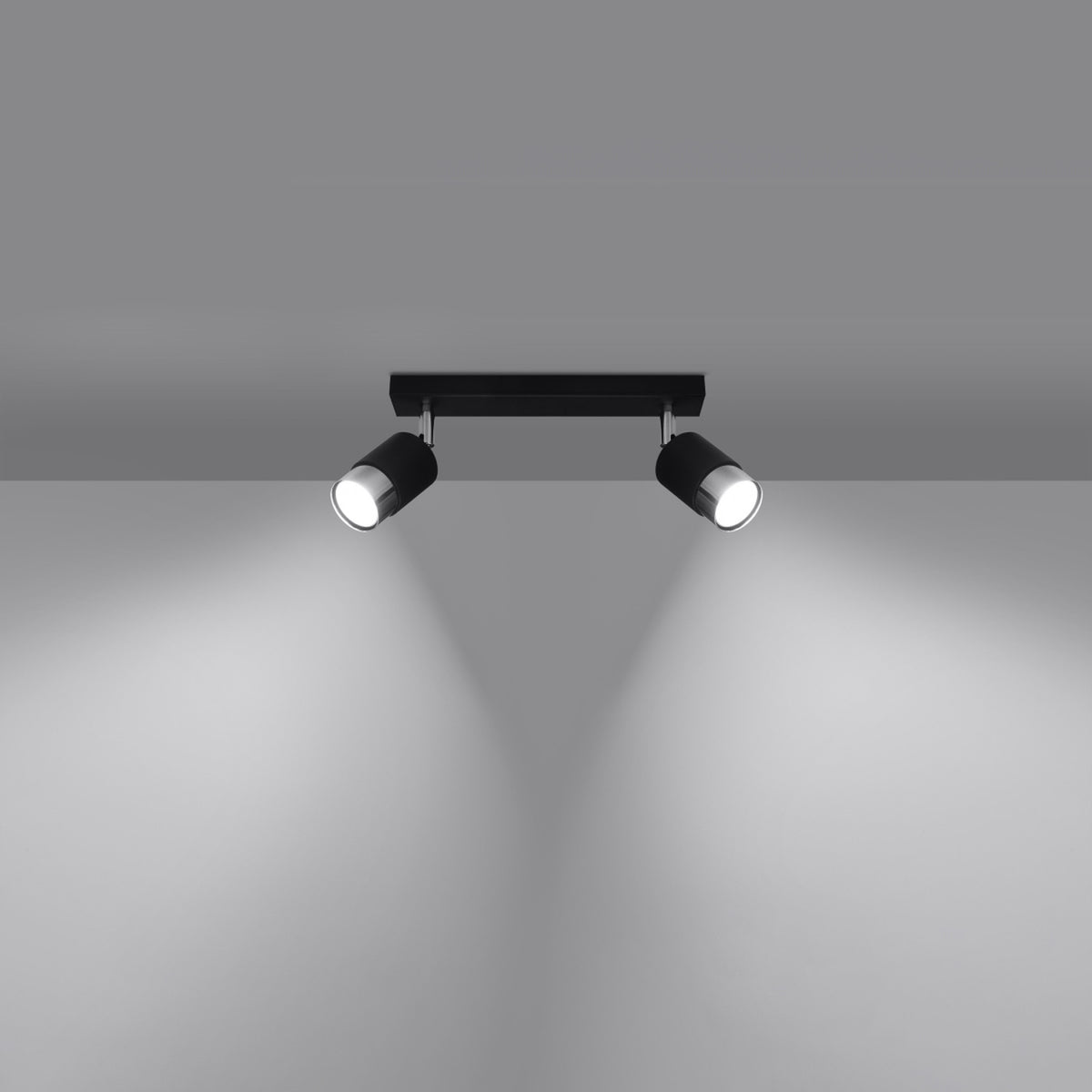 Mise en ambiance montrant deux faisceaux lumineux projetés vers le bas