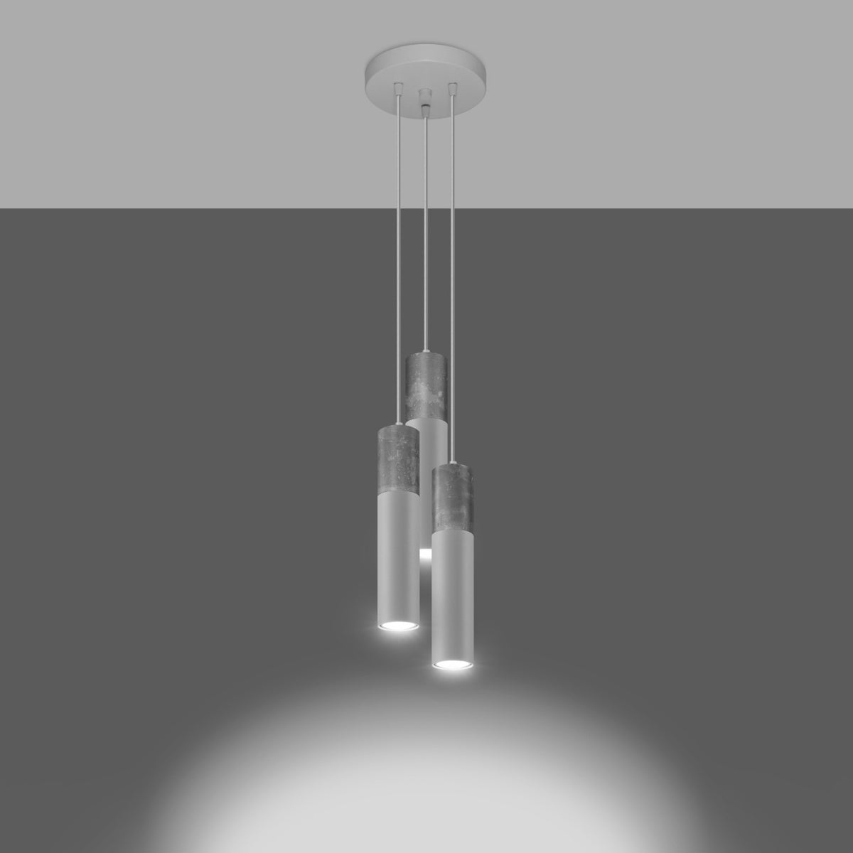 Luminaires suspendus allumés projetant un halo lumineux blanc vers le bas.