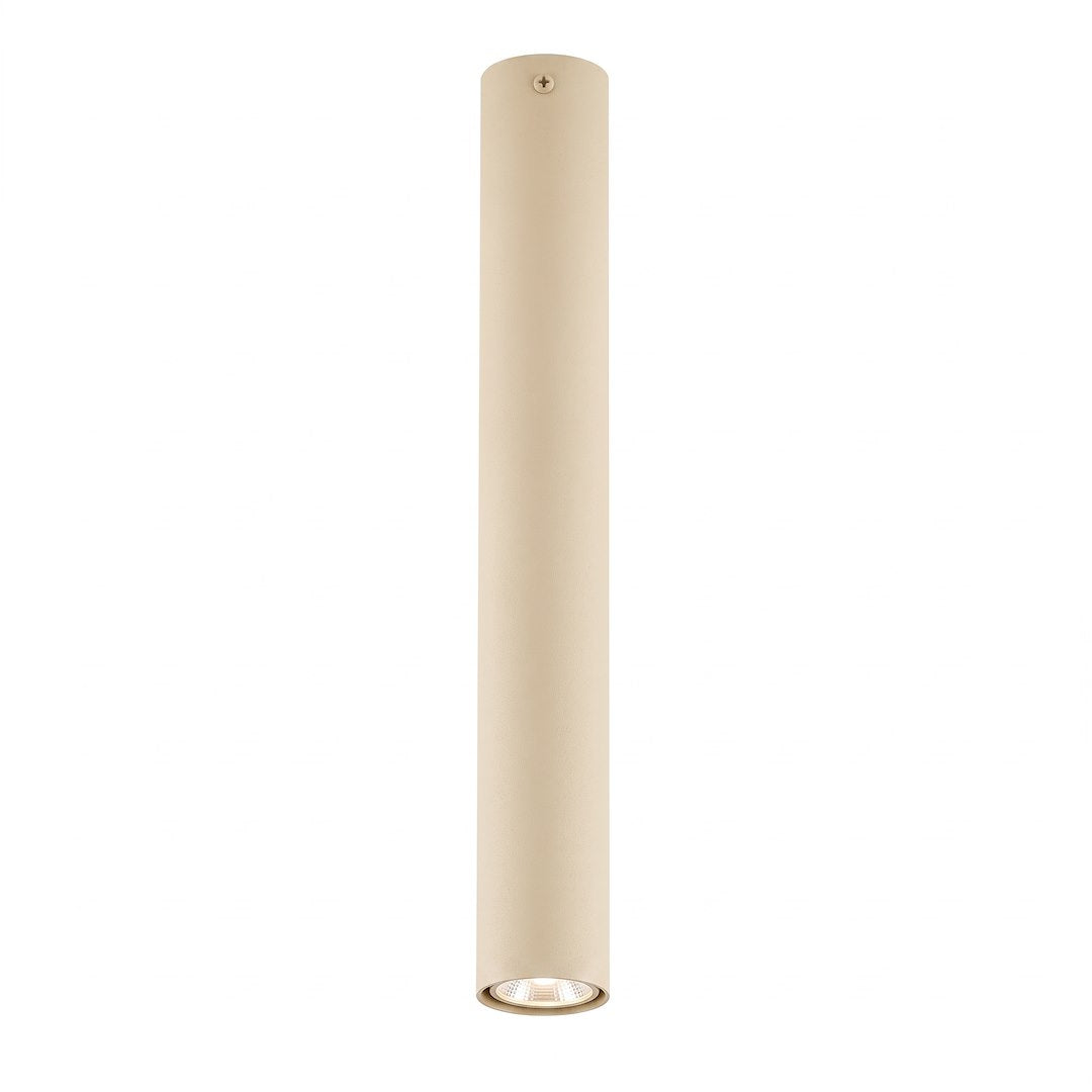 Luminaire cylindrique beige clair vu de face, long tube vertical avec led en partie basse.