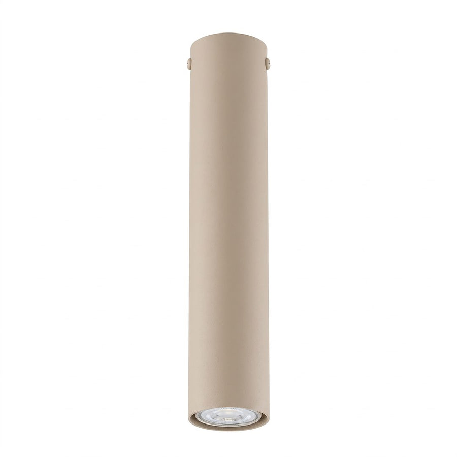 Luminaire cylindrique beige vu de face sur fond blanc, projecteur orientable vers le bas