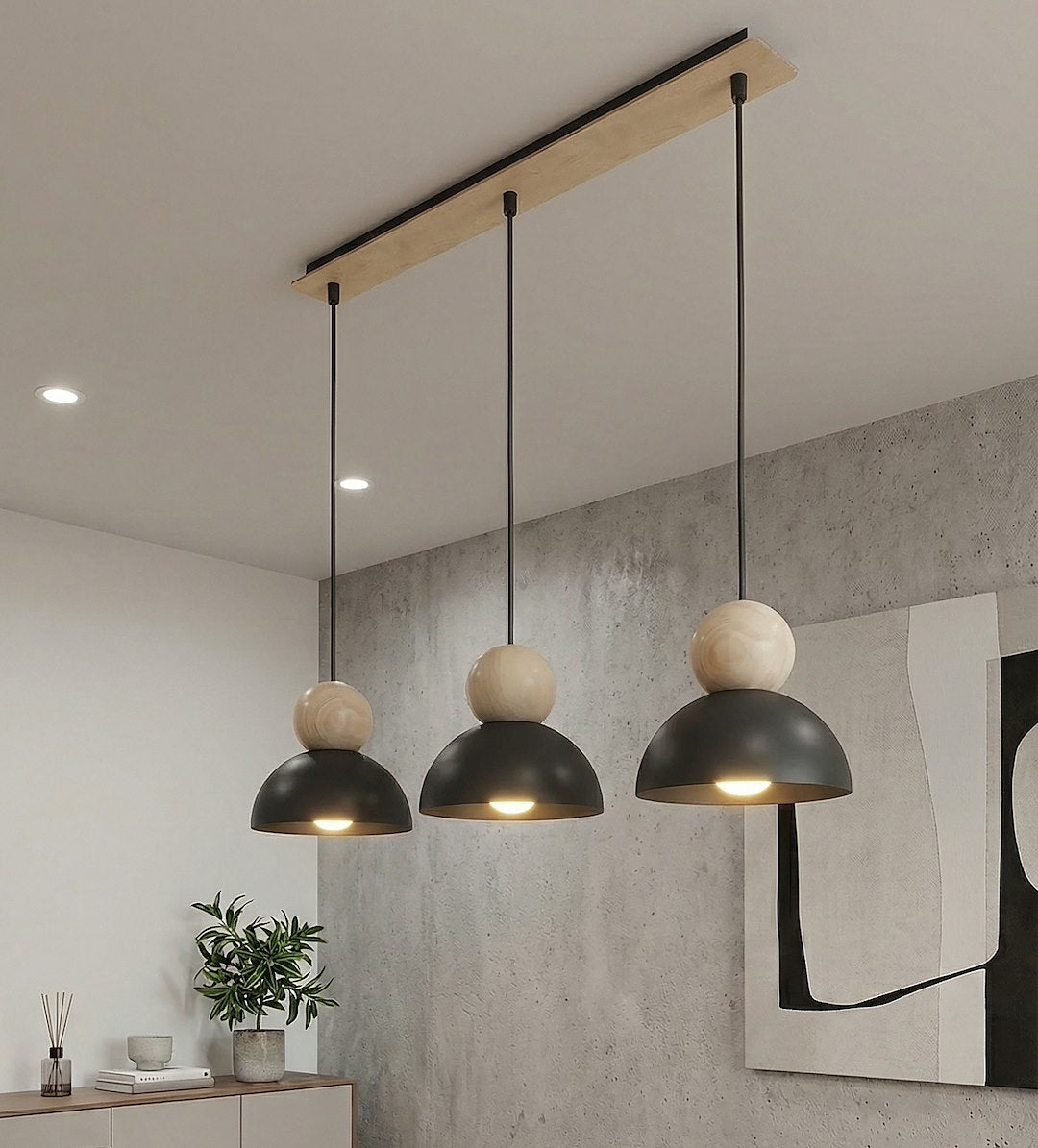 Mise en ambiance sur un mur béton gris, près d'une plante verte