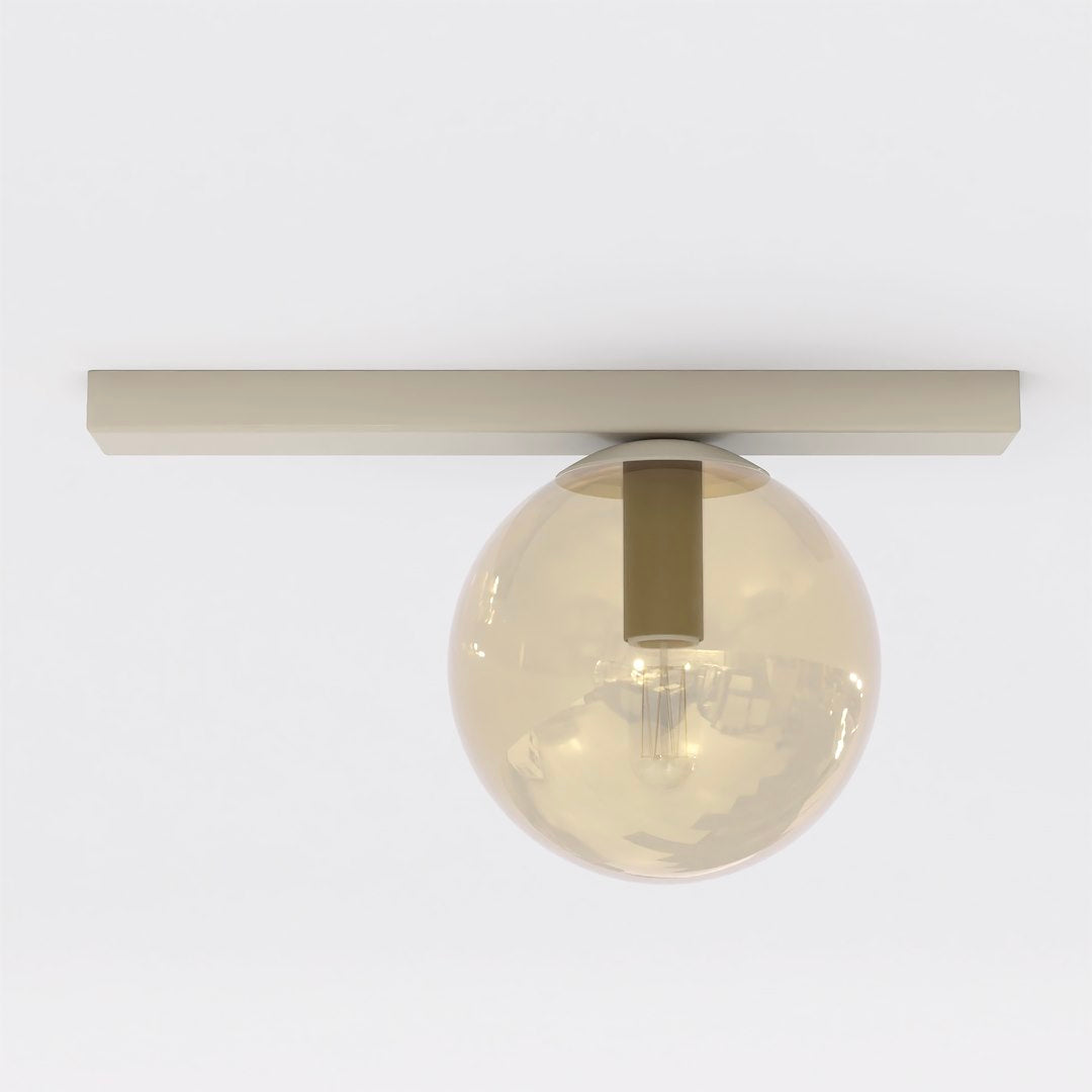 Plafonnier de face sur fond blanc, barre beige et globe de verre ambré