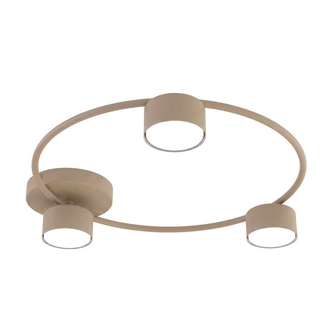 Vue de trois quarts montrant l'anneau beige et les diffuseurs cylindriques éteints