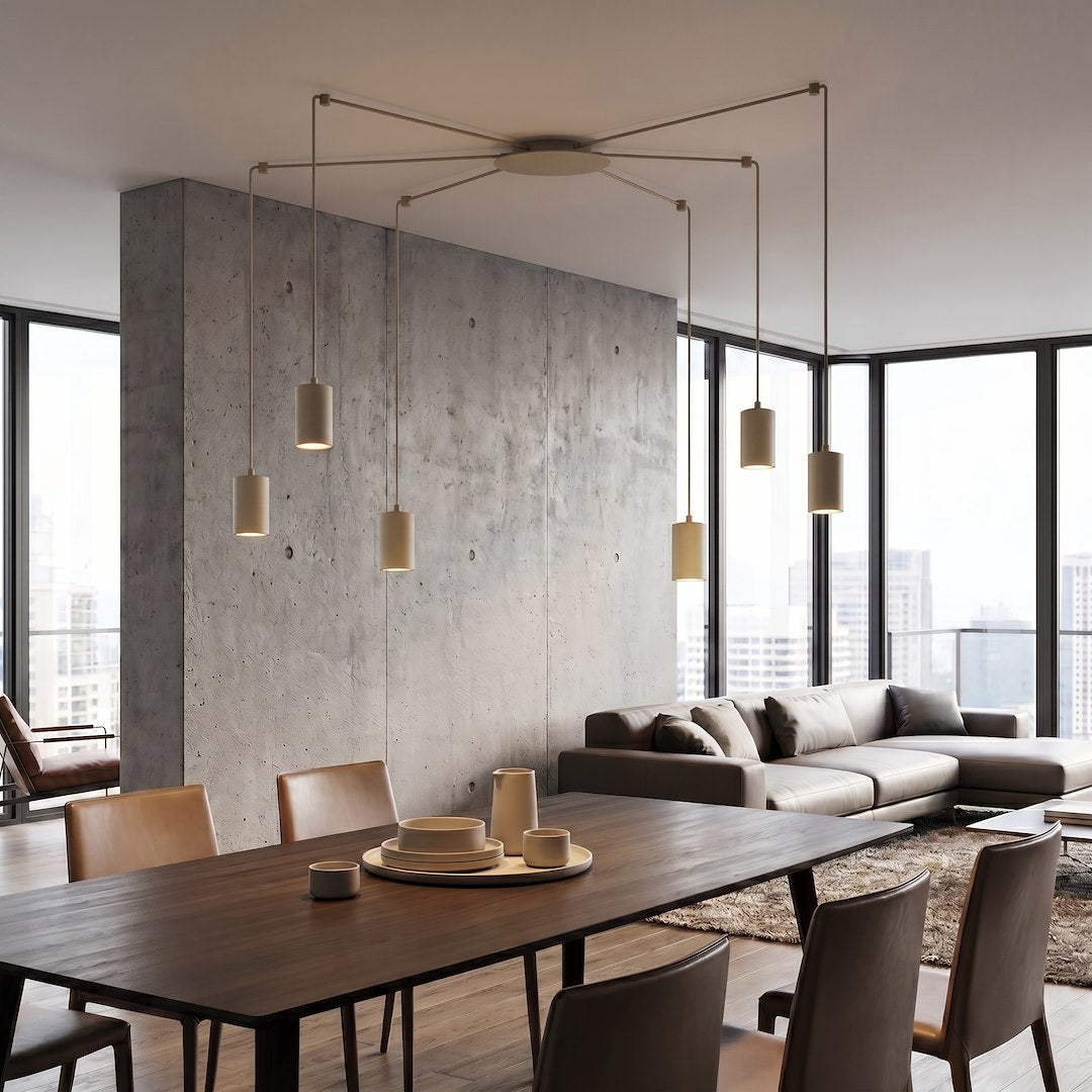 Mise en ambiance au-dessus d'une table à manger dans un séjour béton