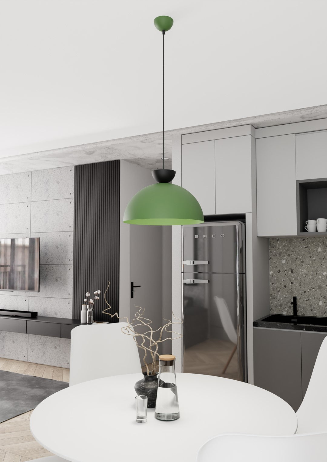 Suspension verte installée au-dessus d'une table ronde dans une cuisine moderne