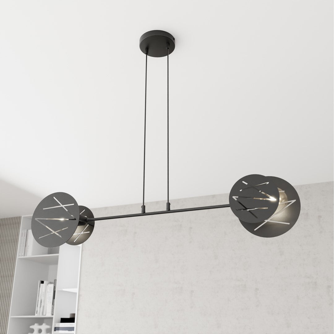Vue rapprochée des deux diffuseurs circulaires ajourés de la suspension.