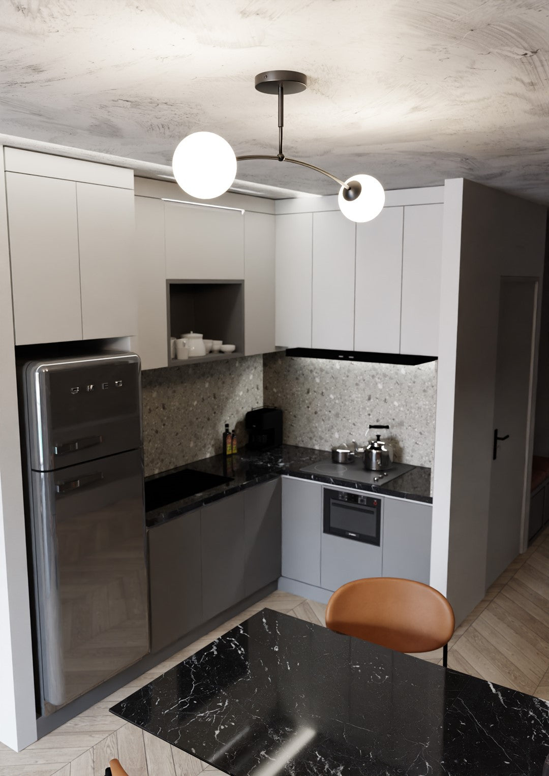 Vue large de la cuisine grise et noire avec le luminaire suspendu au plafond