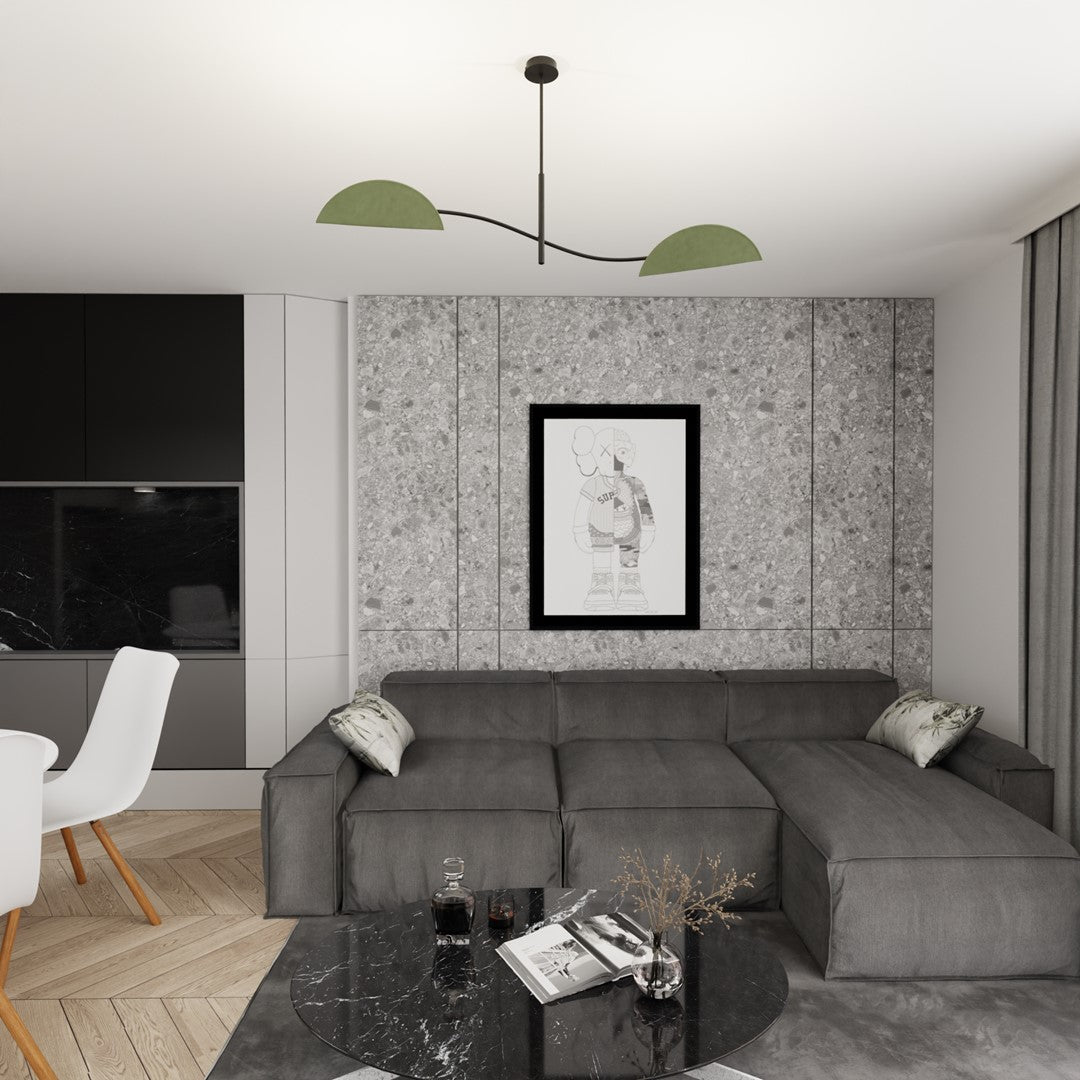 Luminaire suspendu dans un salon gris avec canapé d'angle et parquet