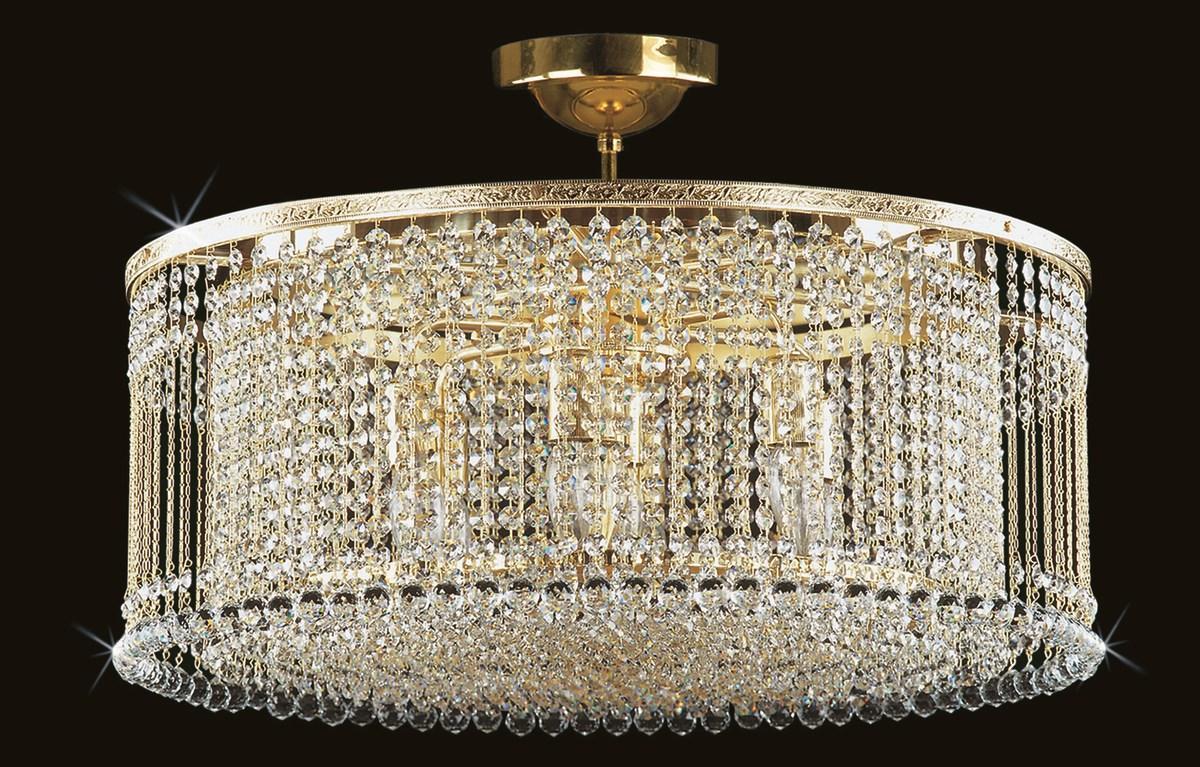 Lustre plafonnier doré à pampilles de cristal, monture ronde, vue de face.