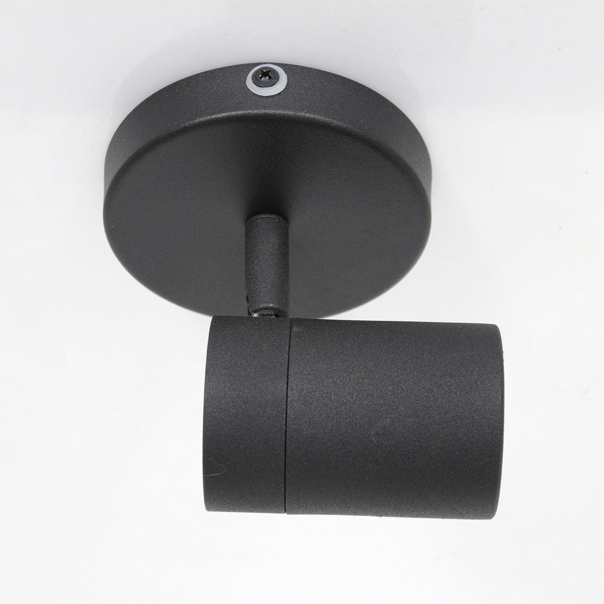 Profil du luminaire noir éteint, montrant le cylindre et la base de fixation.