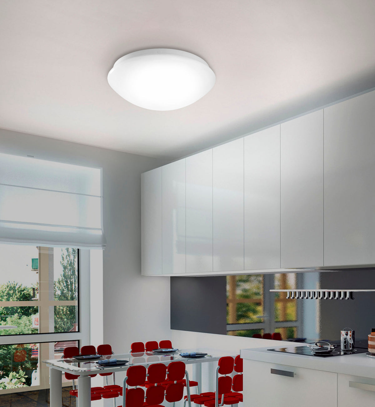 Mise en ambiance du plafonnier blanc fixé au plafond d'une cuisine moderne.