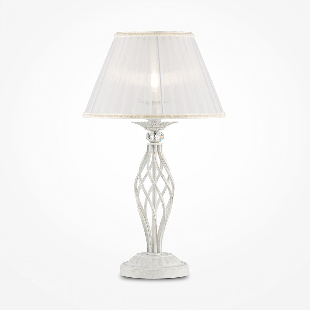 Lampe de chevet blanche de face, abat-jour conique plissé et pied torsadé
