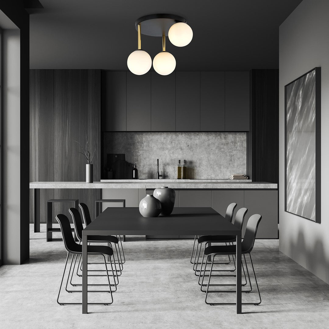 Mise en ambiance au-dessus d'une table de salle à manger sombre et moderne