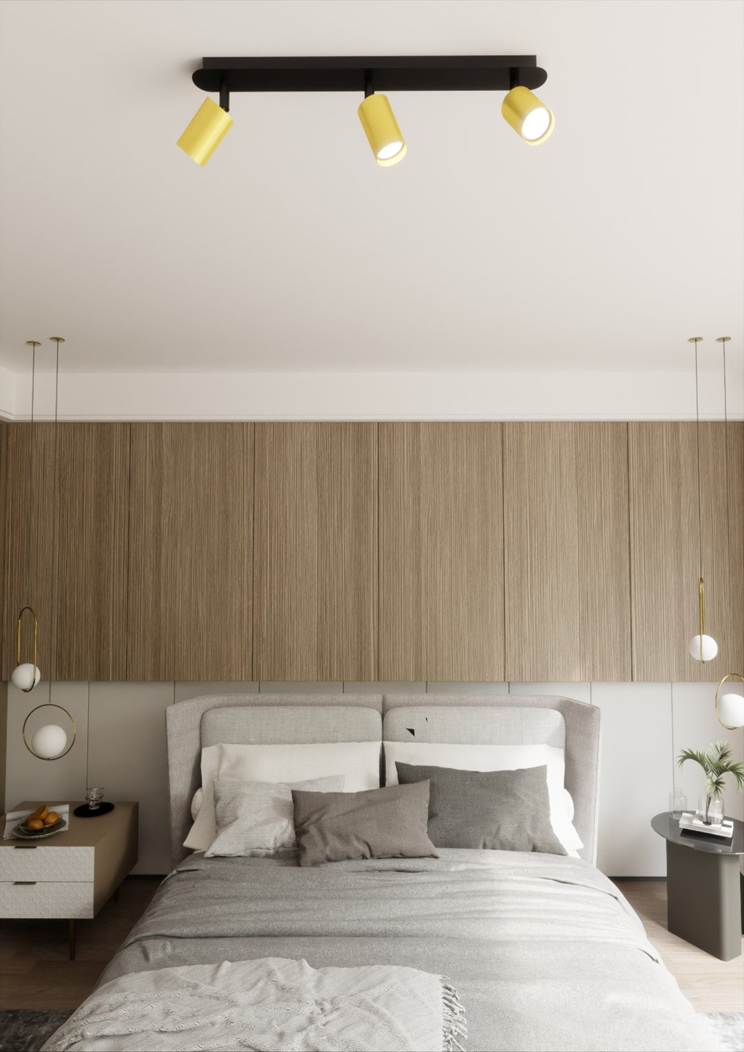 Plafonnier fixé au plafond d'une chambre, tête de lit en bois clair et lit gris
