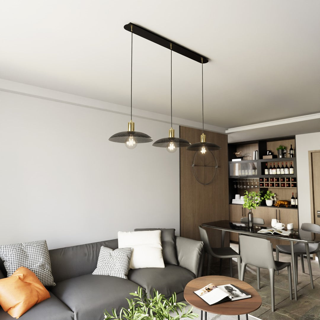 Mise en ambiance au-dessus d'une table, suspension triple dans un séjour moderne