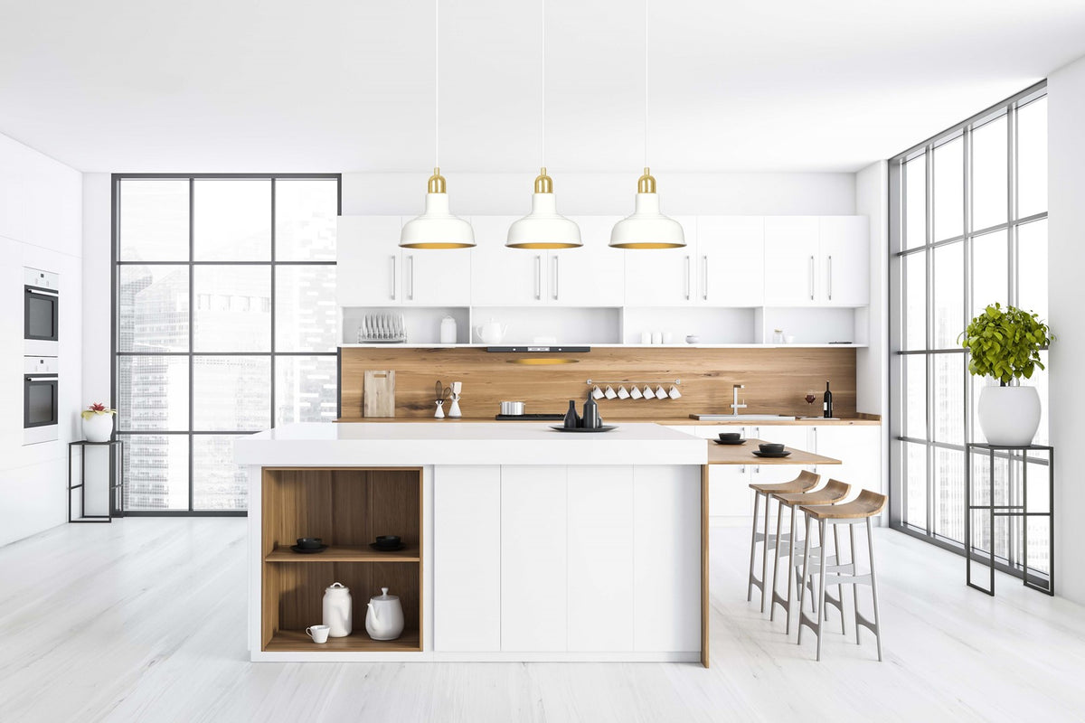 Mise en ambiance cuisine moderne, rampe blanche suspendue au-dessus de l'îlot central