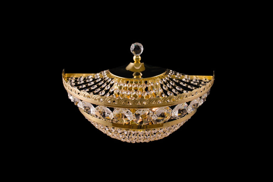 Vue en plongée montrant la forme en demi-coupe et le cabochon sommital
