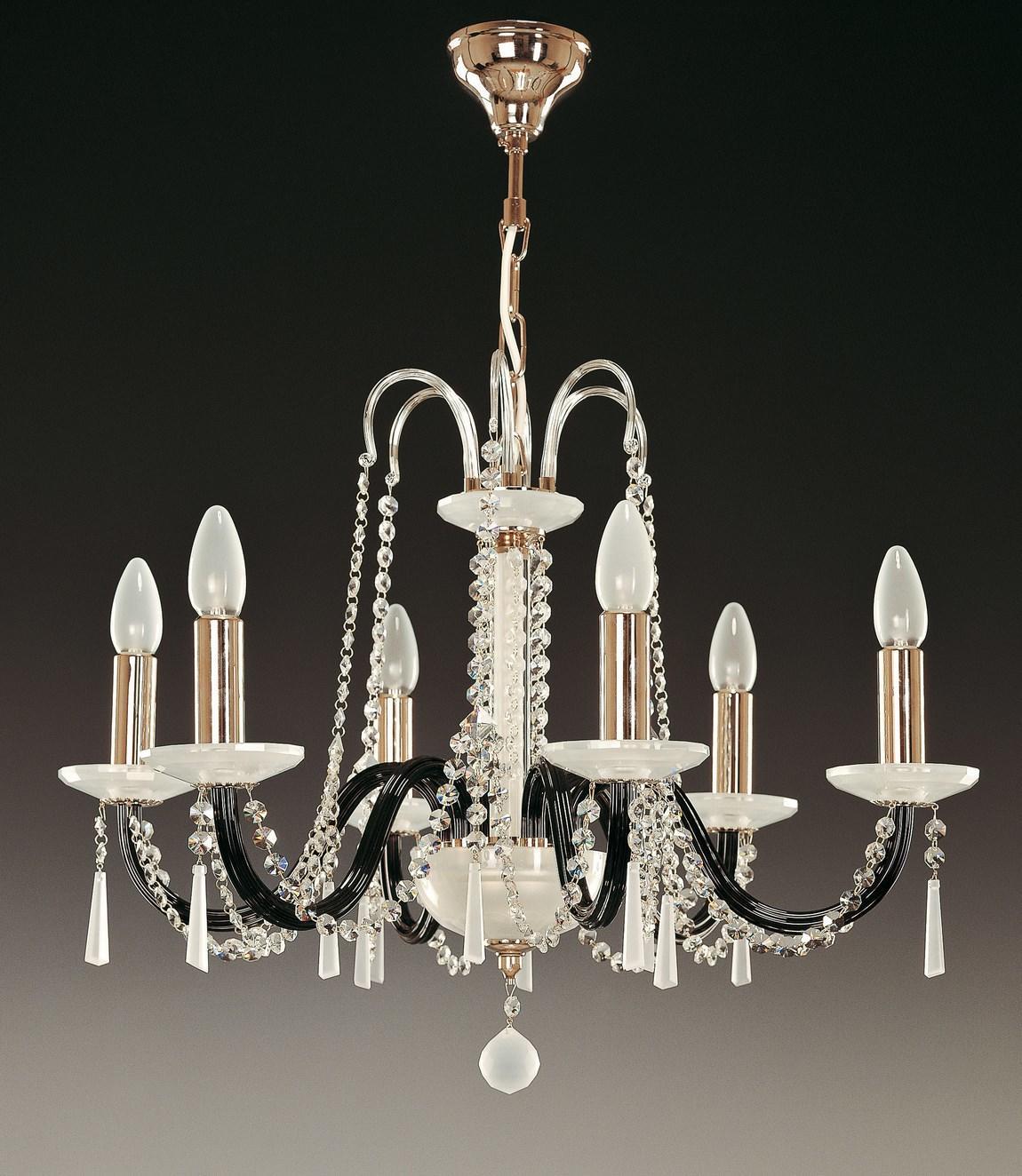 Lustre complet à six bras noirs et cristaux, suspendu sur fond sombre dégradé.