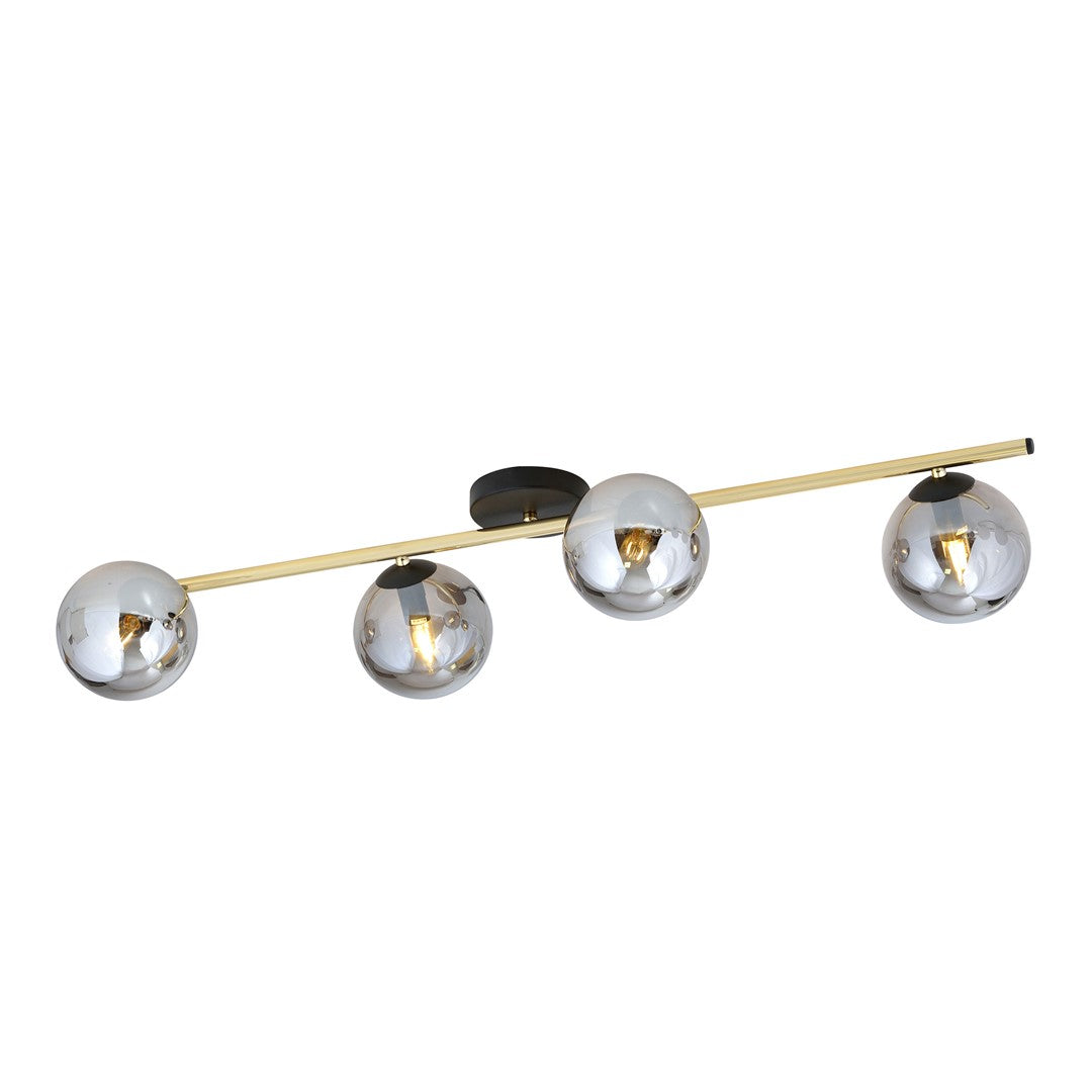 Vue de face du plafonnier quatre lumières, tige dorée et globes fumés