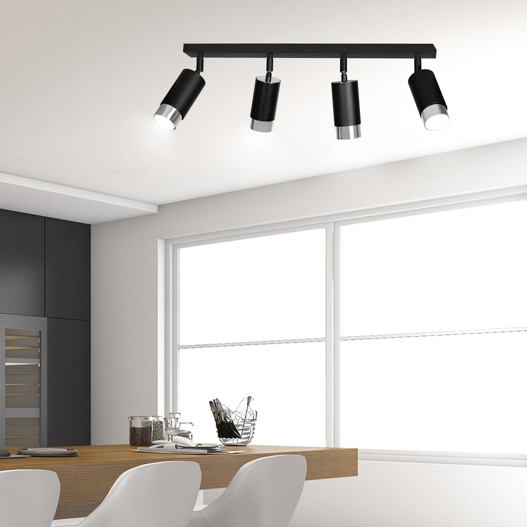 Vue en plongée du luminaire au plafond d'une pièce claire contemporaine