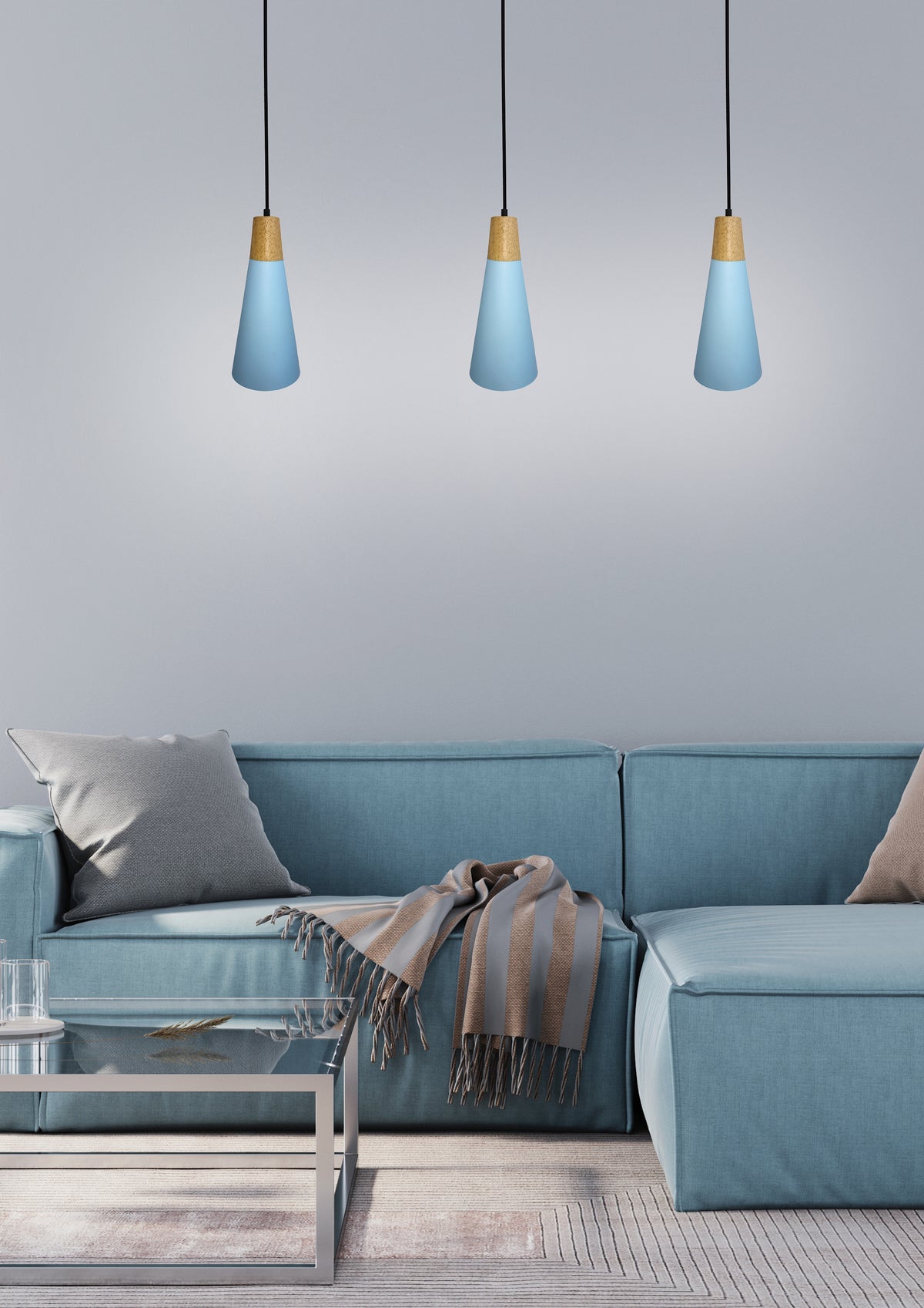 Mise en ambiance : trio de luminaires bleus suspendus, reflets sur la table basse