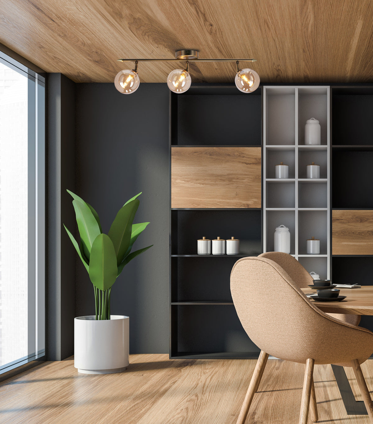 Mise en ambiance du plafonnier allumé au-dessus d'une table dans un intérieur bois