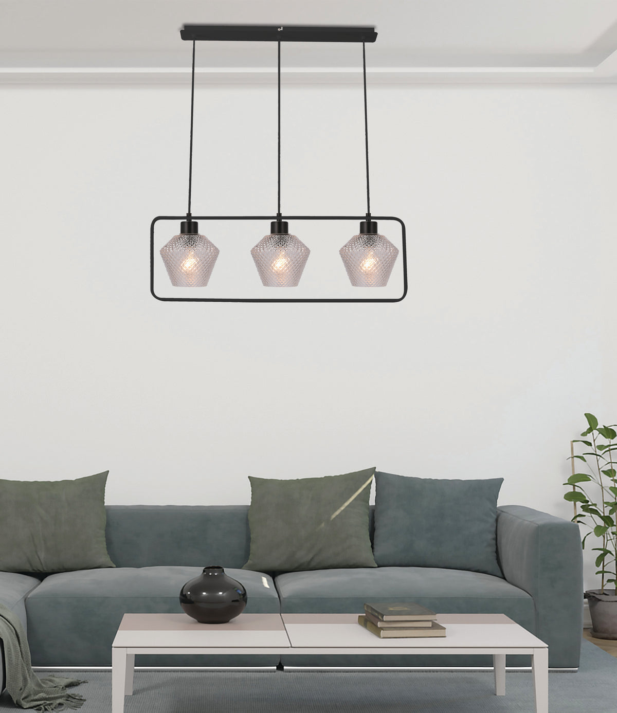 Mise en ambiance au-dessus d'un canapé gris dans un salon contemporain
