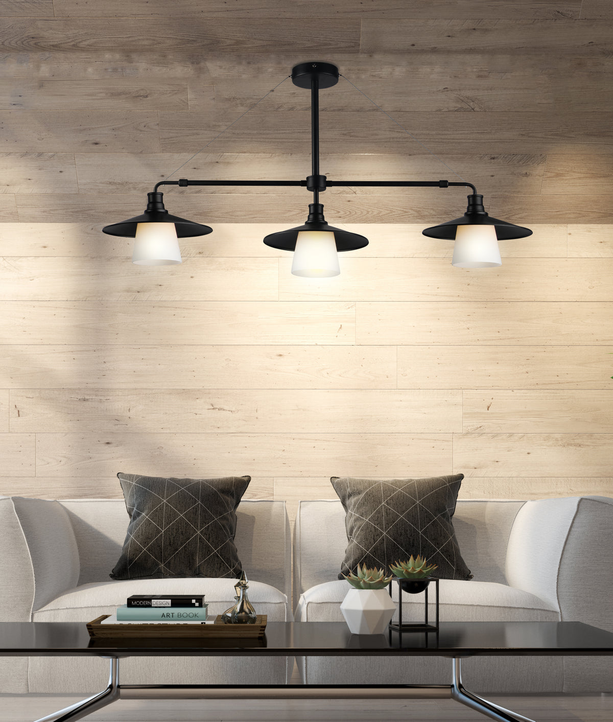 Mise en ambiance salon avec suspension noire au-dessus d'une table basse devant un canapé beige.