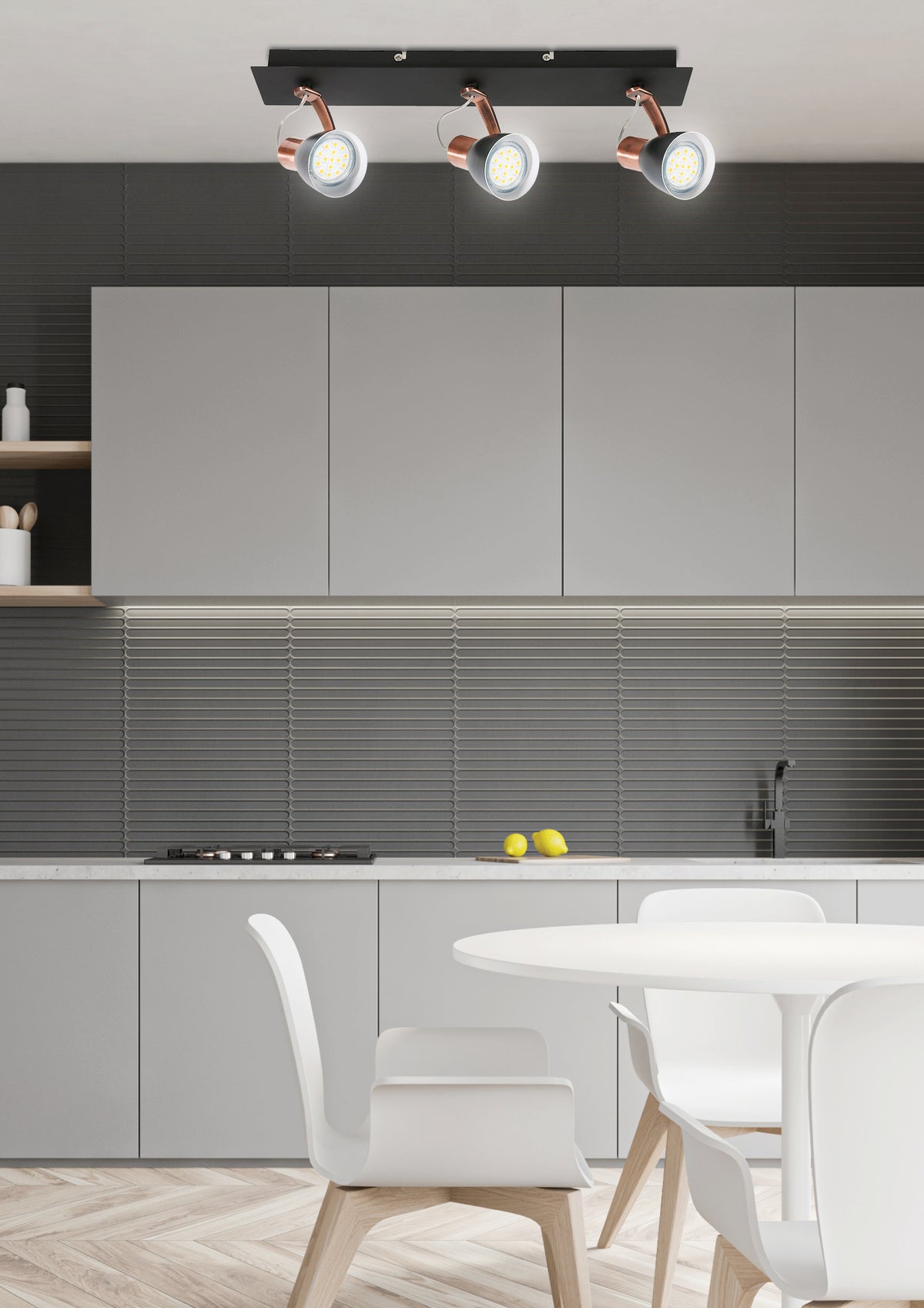 Luminaire en situation dans une cuisine moderne, spots allumés au-dessus d'une table blanche.