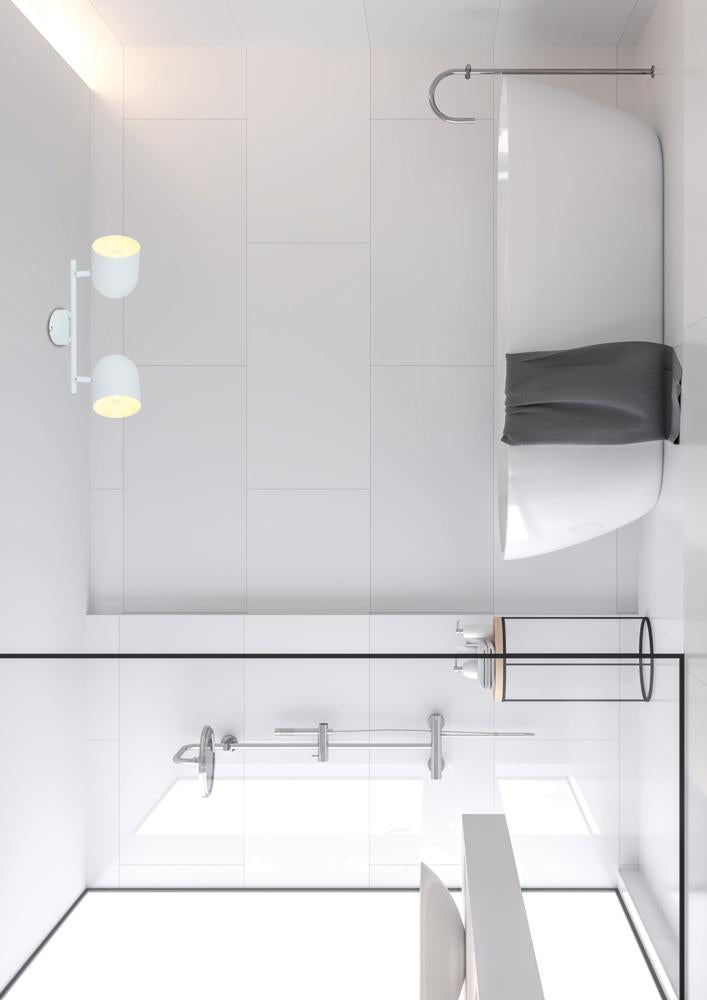 Vue de dessus du plafonnier deux spots blancs dans une salle de bain