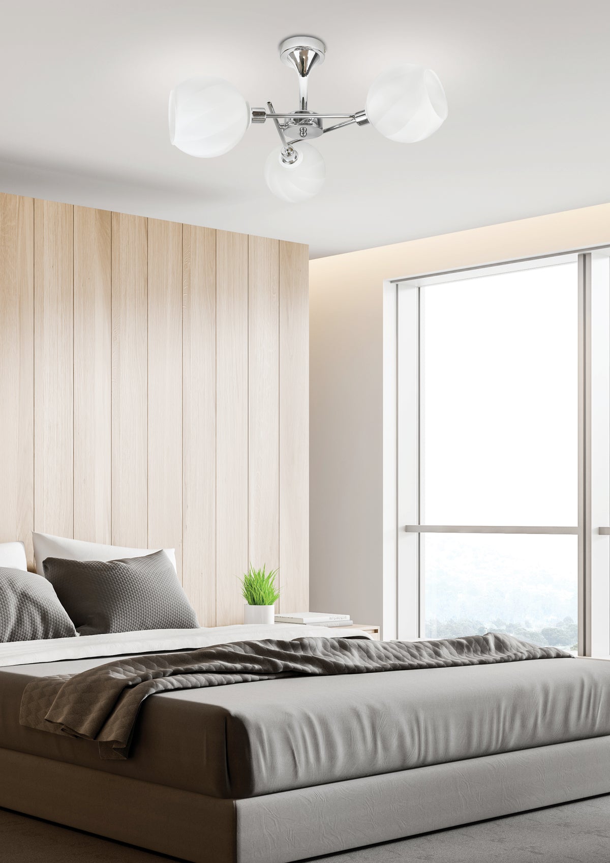 Mise en ambiance : plafonnier fixé au plafond d'une chambre à tête de lit en bois clair
