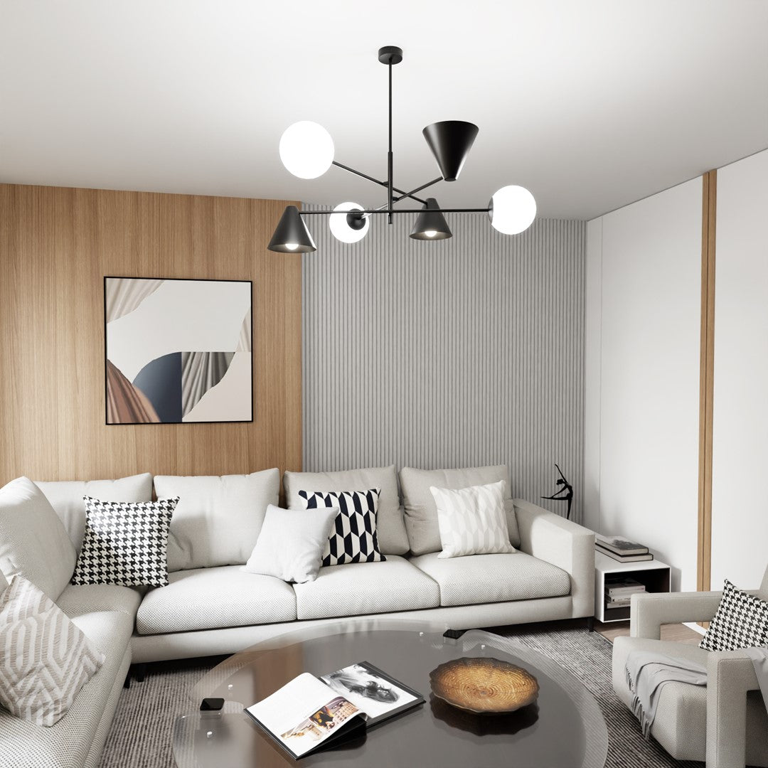 Ambiance salon moderne, suspension noire allumée au-dessus d'un canapé blanc