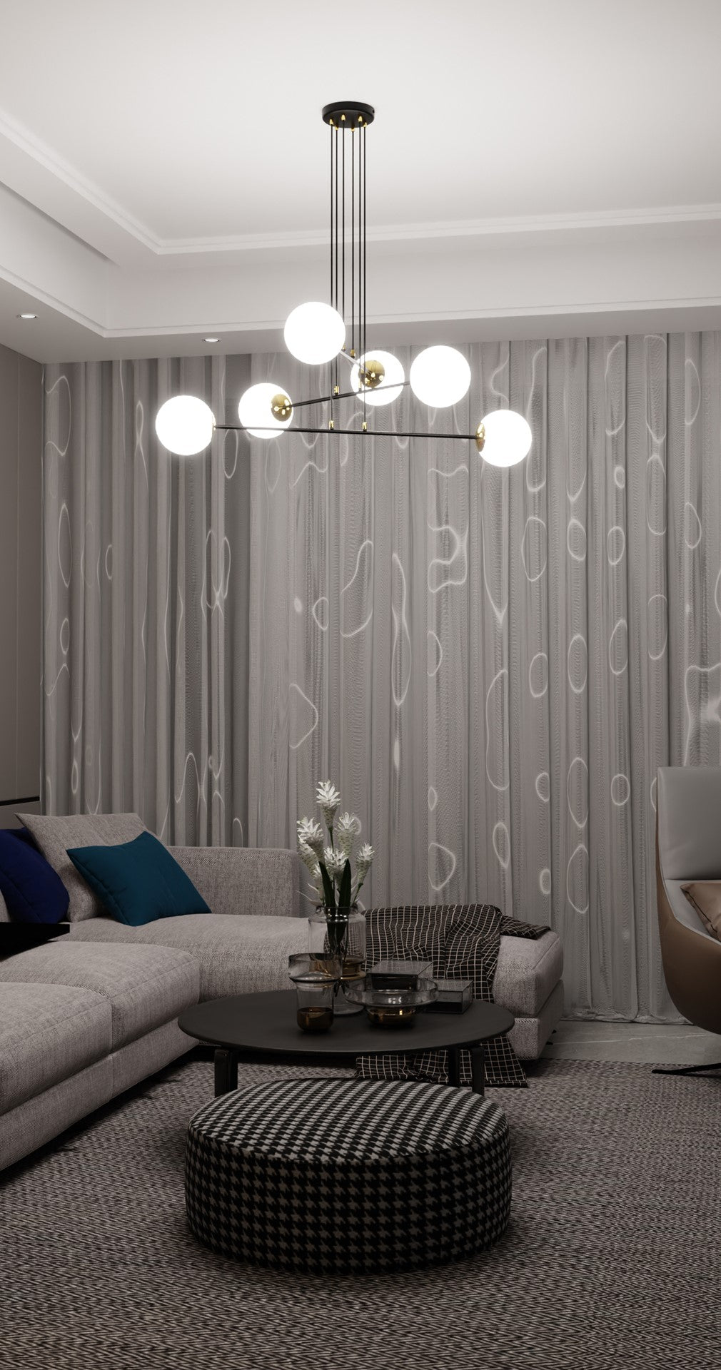 Ambiance salon avec rideaux clairs, suspension lumineuse à six sphères au-dessus de la table basse.