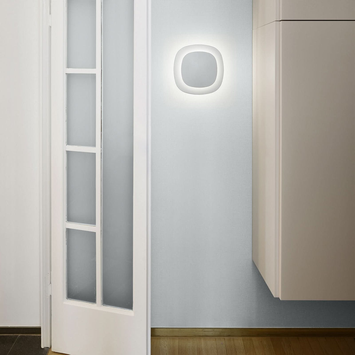Applique murale LED Luthien en aluminium, blanc mat et transparent, hauteur 27 cm