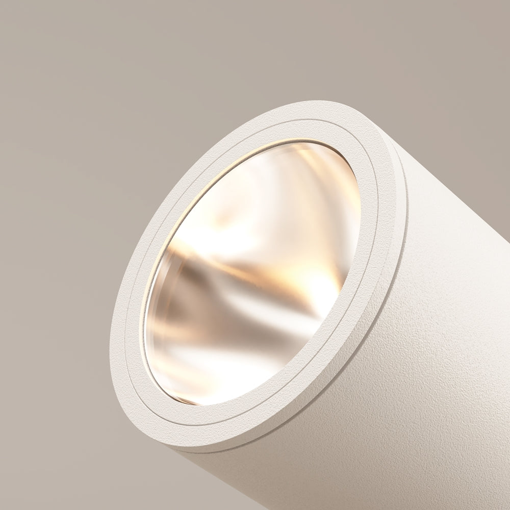 Vue rapprochée de la face avant du luminaire blanc sur fond neutre