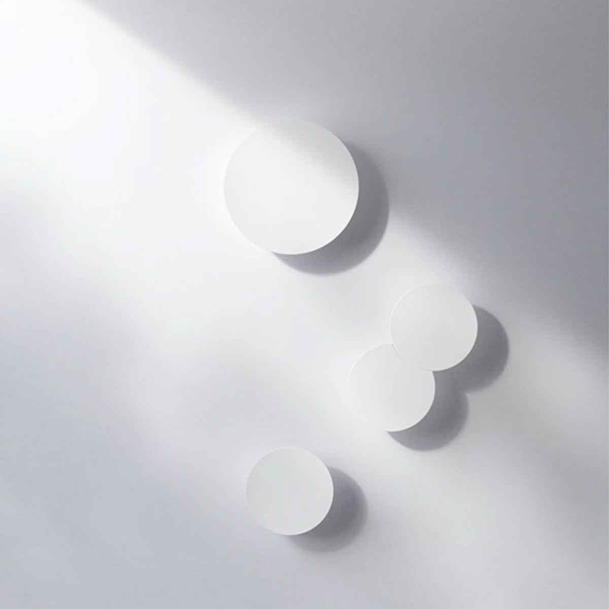Applique murale LED Collide H0 en aluminium, blanc mat, Ø 22 cm, 2700 K