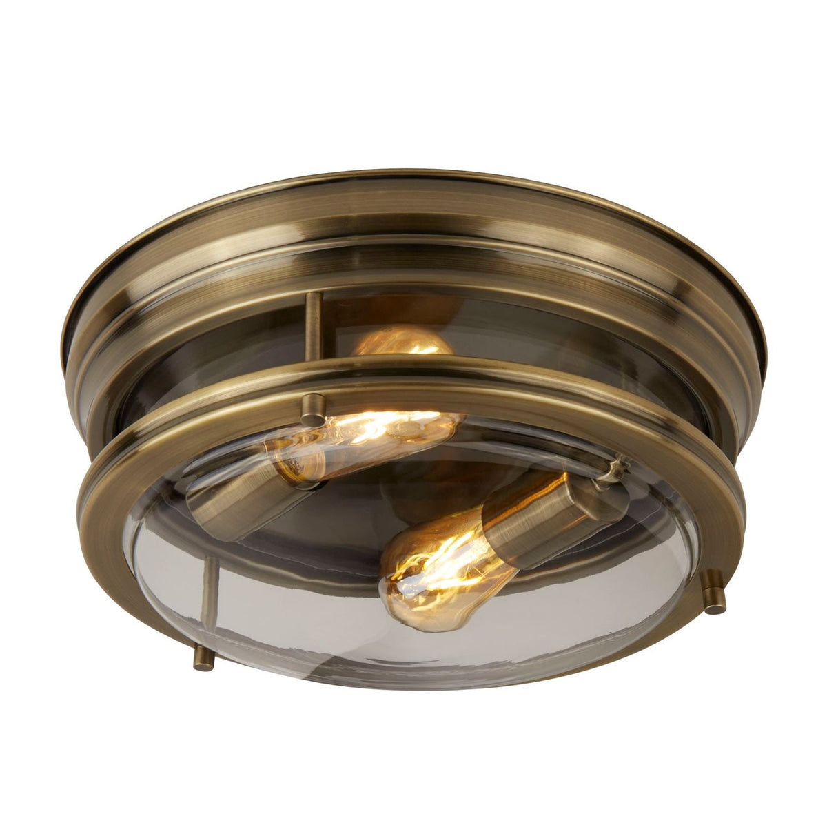 Plafonnier rond en laiton ancien avec deux ampoules visibles sous verre transparent.