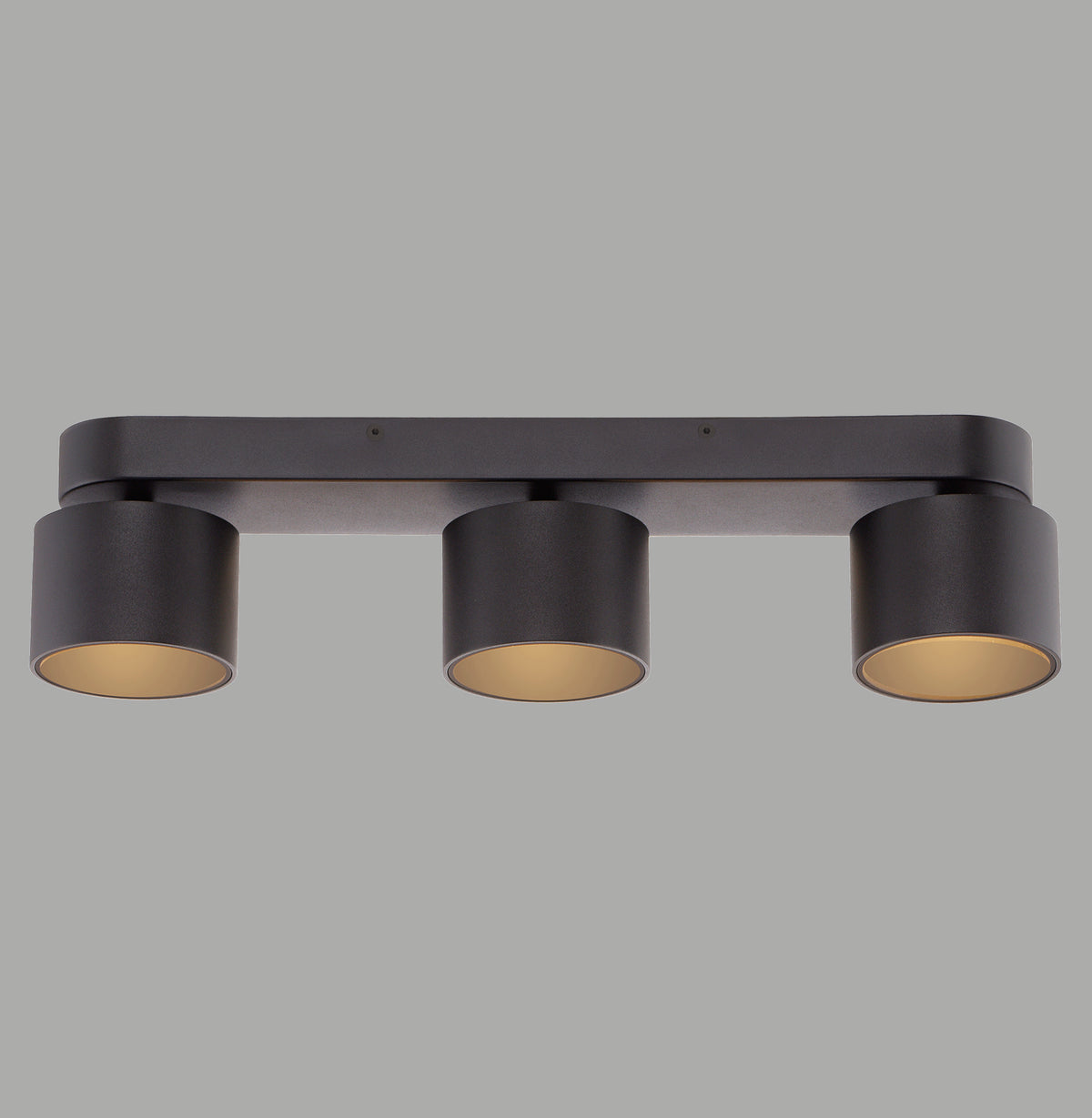 Vue de face du plafonnier noir à trois spots cylindriques orientables, intérieur doré.