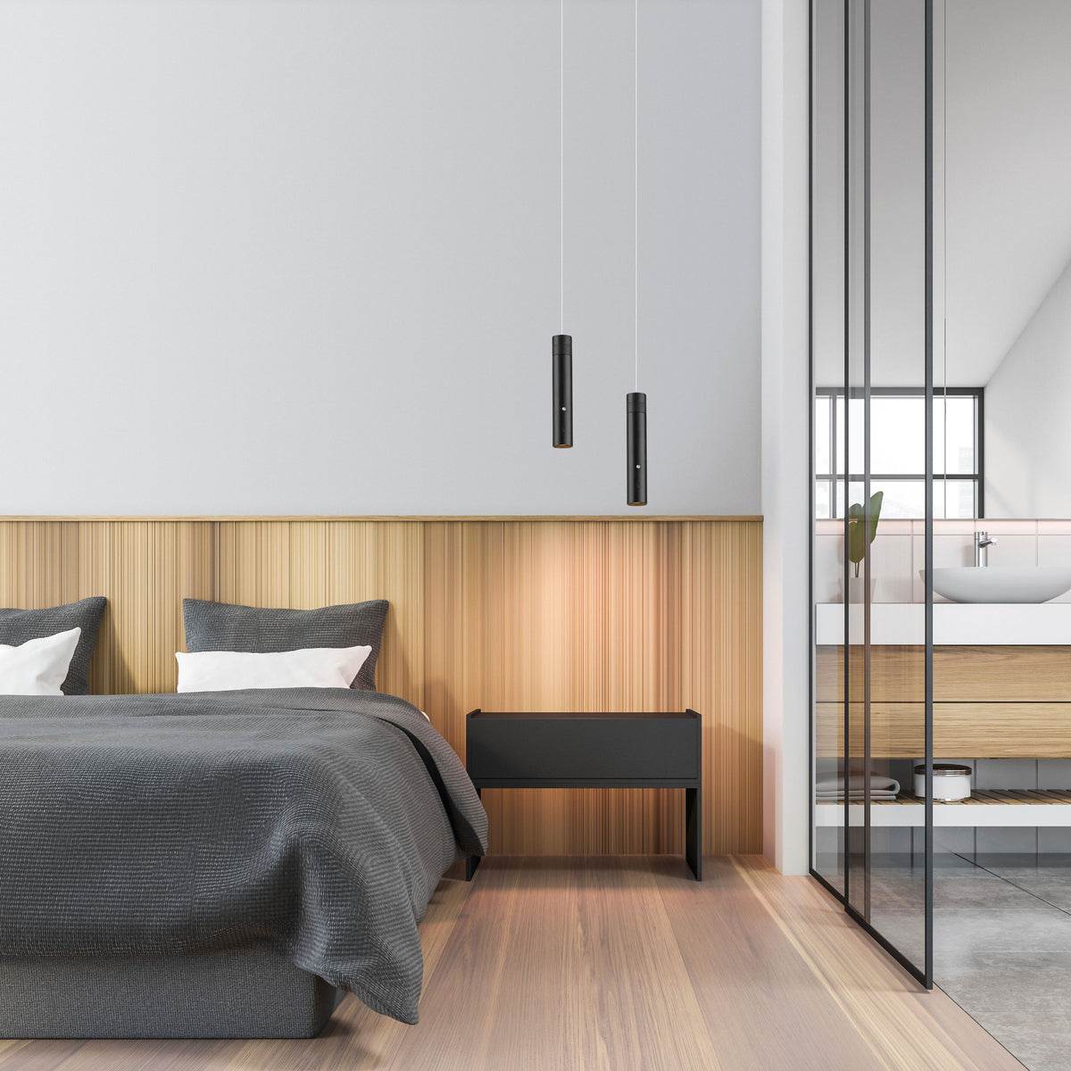 Mise en ambiance chambre avec deux suspensions noires au-dessus d'une table de nuit