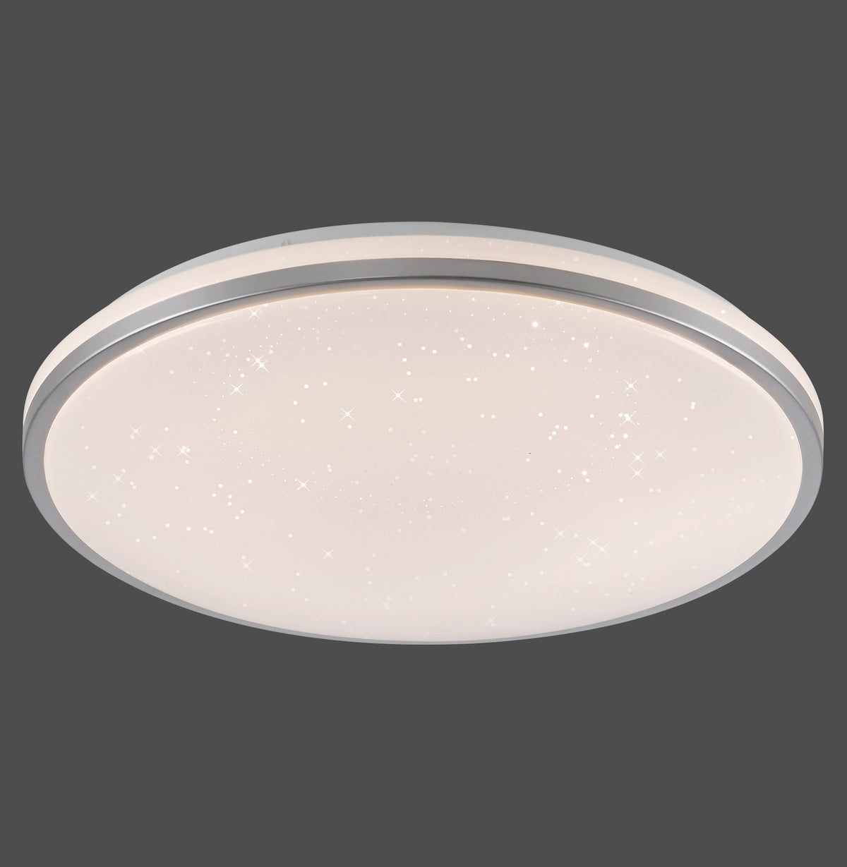 Plafonnier rond argenté avec diffuseur étoilé, vue de face sur fond gris.