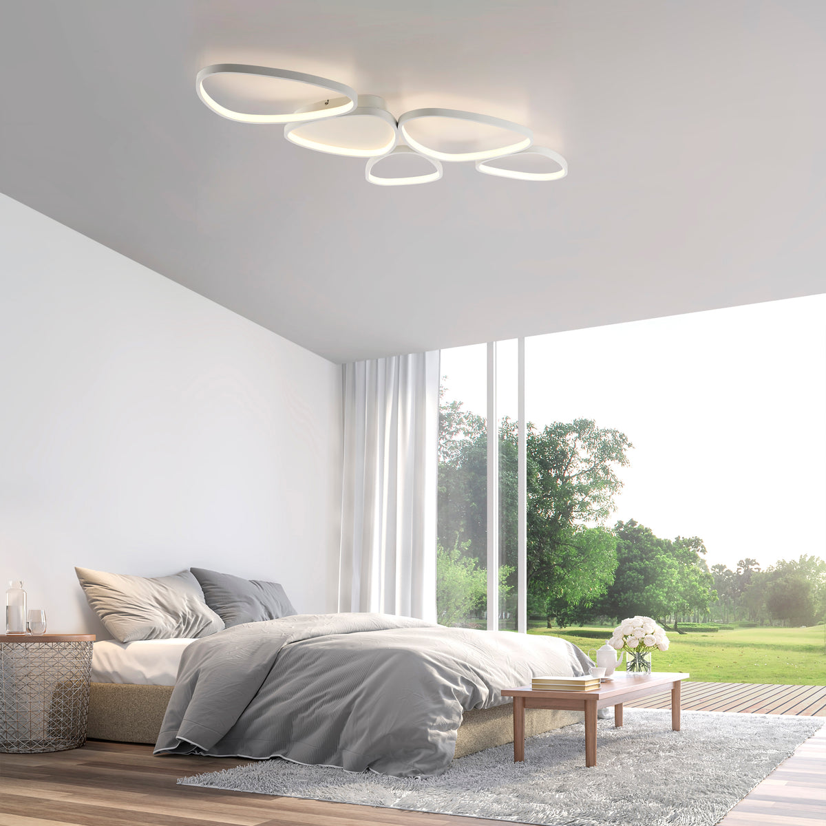 Mise en ambiance dans une chambre moderne, plafonnier allumé au-dessus du lit.
