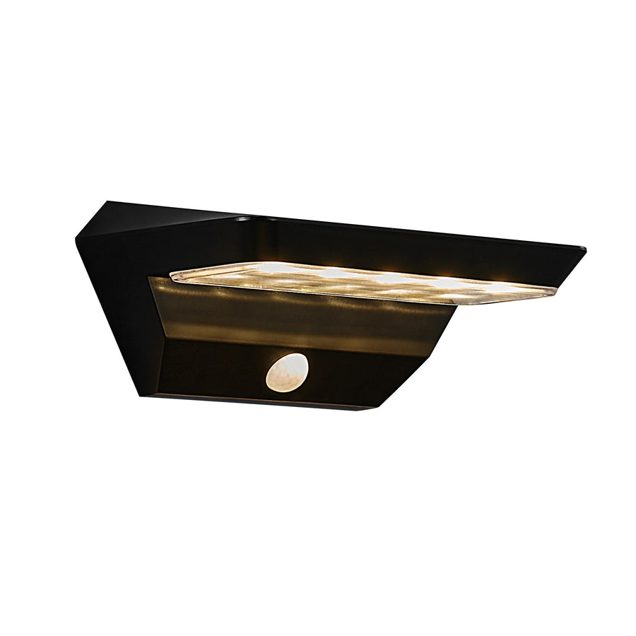 Vue de trois quarts du boîtier noir avec bandeau lumineux et détecteur